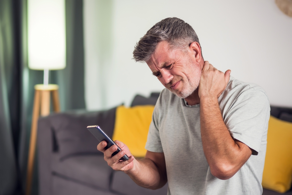 Tech Neck Explained How Your Phone Is Causing Chronic Pain - chiropractor in metairie